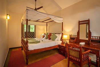 Serene bedroom at Vythiri Mist Resort Wayanad